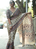 Ivory Modal Silk Ajrakh Printed Saree with Traditional Floral Motifs, Heritage Border & Tassel Detailing